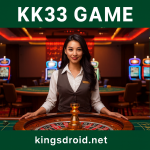 Female dealer standing behind a roulette table with KK33 Game title above and kingsdroid.net branding below on a green background.